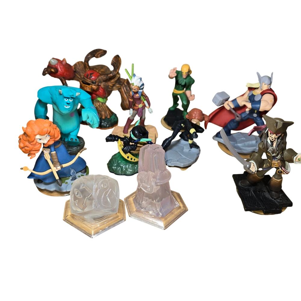 Lot of 11 Disney Infinity and Activision Skylander Pieces